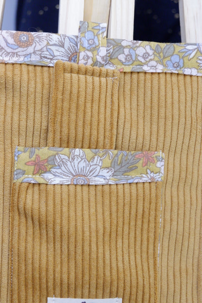 pochette de protection pour livre de poche jaune et fleurie